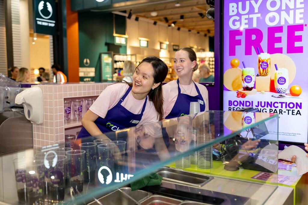 Chatime staff serving customers at the Bondi Junction bubble tea store during a Buy One Get One Free promotion.