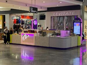 Young Australian entrepreneur opening a new Chatime store — symbol of Gen Z freedom franchising and modern business ownership.