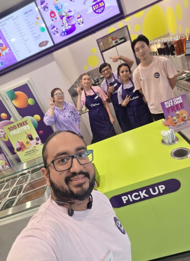 Chatime franchise team smiling inside a store in Australia, reflecting a supportive and positive franchise environment.