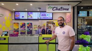 Chatime franchise manager standing confidently inside the store, representing leadership within sustainable franchises in Australia
