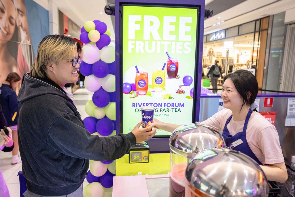 Customer being served bubble tea at a Chatime franchise store in an Australian shopping centre